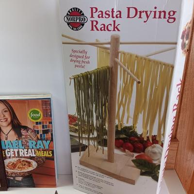 Cookbooks with NorPro Pasta drying rack - cutting board and a variety of knives