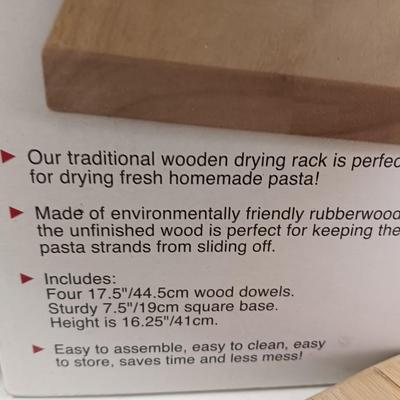 Cookbooks with NorPro Pasta drying rack - cutting board and a variety of knives