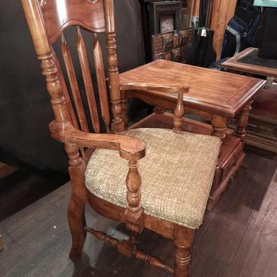 Wooden end table with a drawer, and a fabric seated arm chair