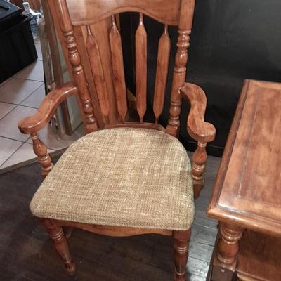 Wooden end table with a drawer, and a fabric seated arm chair