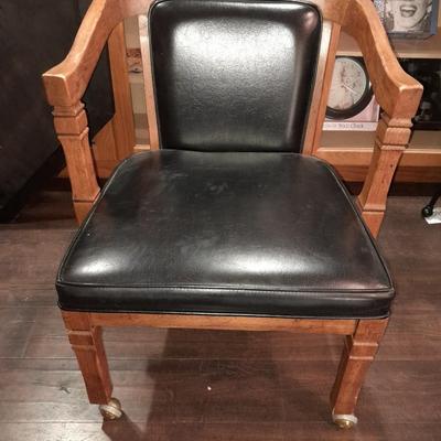 Mersman Wooden end table with drawer and leather like top with Black cushioned armchair