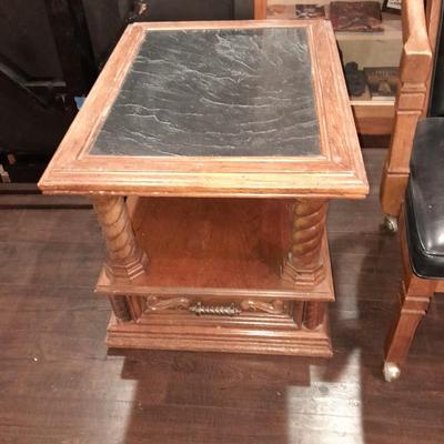 Mersman Wooden end table with drawer and leather like top with Black cushioned armchair
