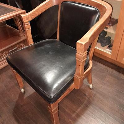 Mersman Wooden end table with drawer and leather like top with Black cushioned armchair