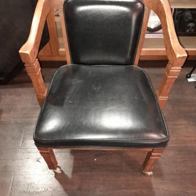 Mersman Wooden end table with drawer and leather like top with Black cushioned armchair