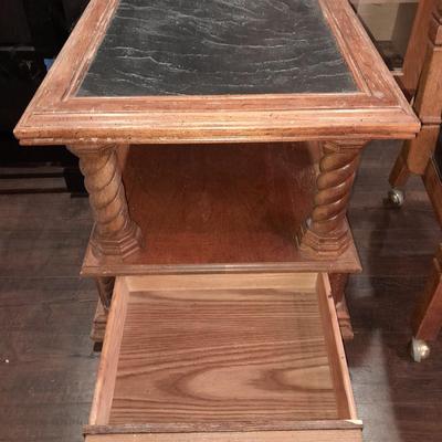 Mersman Wooden end table with drawer and leather like top with Black cushioned armchair