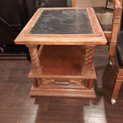 Mersman Wooden end table with drawer and leather like top with Black cushioned armchair