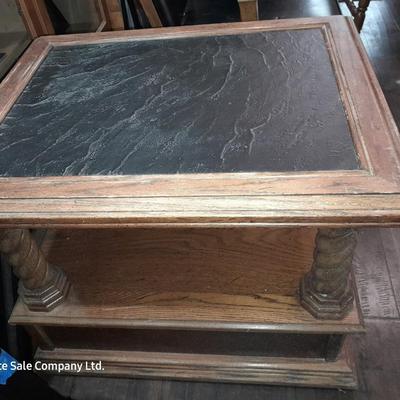 Mersman Wooden end table with drawer and leather like top with Black cushioned armchair