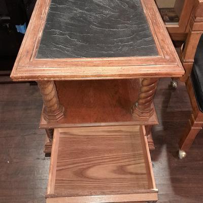 Mersman Wooden end table with drawer and leather like top with Black cushioned armchair