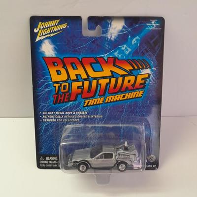 New in package Johnny Lightning Back to the Furure Time Machine Die cast car