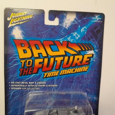 New in package Johnny Lightning Back to the Furure Time Machine Die cast car