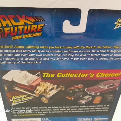 New in package Johnny Lightning Back to the Furure Time Machine Die cast car
