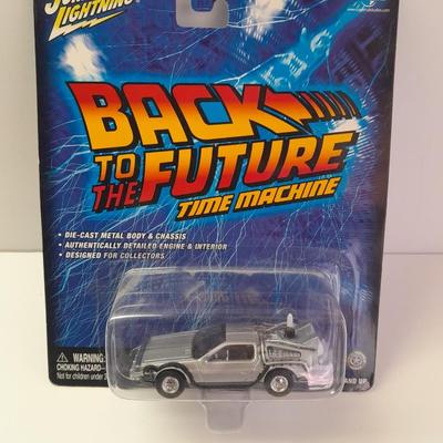 New in package Johnny Lightning Back to the Furure Time Machine Die cast car