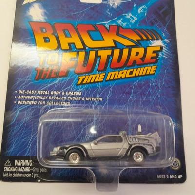 New in package Johnny Lightning Back to the Furure Time Machine Die cast car