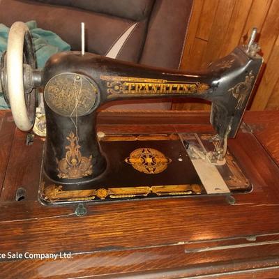 Ornate Antique Franklin Treadle Sewing Machine c. 1917 with Foldaway Cabinet