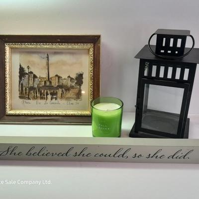 Framed picture - metal lantern - fall scented candle and "She believed she could, so she did" decor.