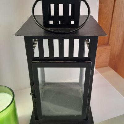 Framed picture - metal lantern - fall scented candle and "She believed she could, so she did" decor.