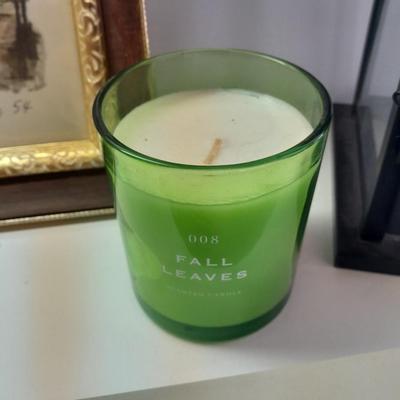 Framed picture - metal lantern - fall scented candle and "She believed she could, so she did" decor.