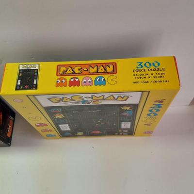 New & sealed Pac Man puzzle and Glow in the dark 100-piece mini puzzles