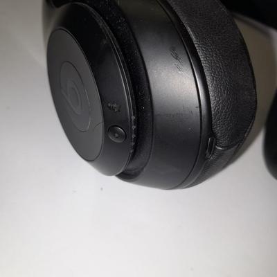 Fold up BEATS headphones with case.
