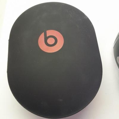 Fold up BEATS headphones with case.