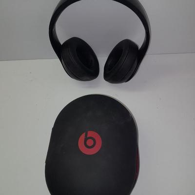 Fold up BEATS headphones with case.