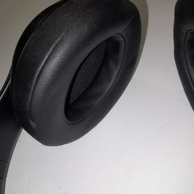 Fold up BEATS headphones with case.