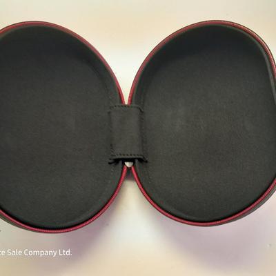 Fold up BEATS headphones with case.