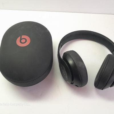 Fold up BEATS headphones with case.