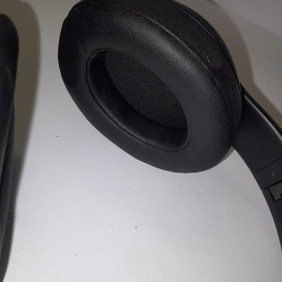 Fold up BEATS headphones with case.