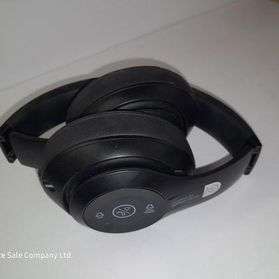 Fold up BEATS headphones with case.