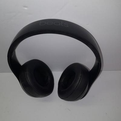 Fold up BEATS headphones with case.