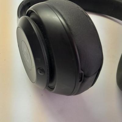 Fold up BEATS headphones with case.