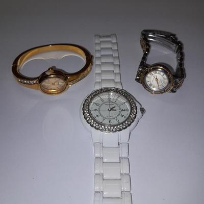 Three Women's watches - Anne Klein II - Gossip - and gold toned band with rhinestones.