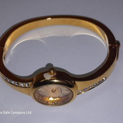 Three Women's watches - Anne Klein II - Gossip - and gold toned band with rhinestones.