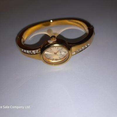 Three Women's watches - Anne Klein II - Gossip - and gold toned band with rhinestones.