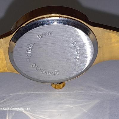 Three Women's watches - Anne Klein II - Gossip - and gold toned band with rhinestones.