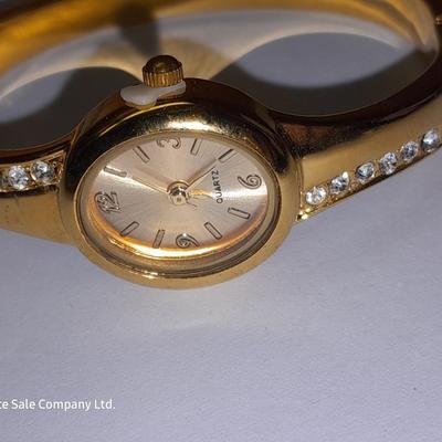 Three Women's watches - Anne Klein II - Gossip - and gold toned band with rhinestones.