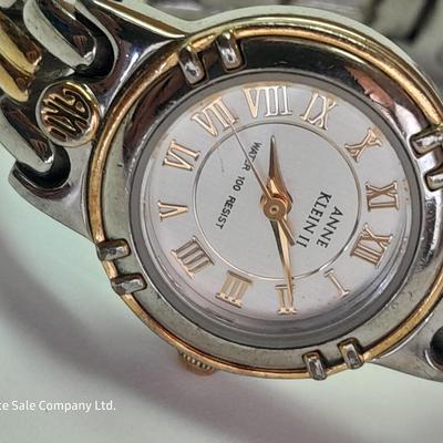 Three Women's watches - Anne Klein II - Gossip - and gold toned band with rhinestones.