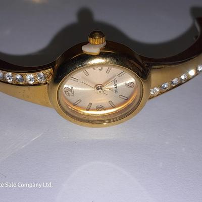 Three Women's watches - Anne Klein II - Gossip - and gold toned band with rhinestones.