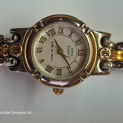 Three Women's watches - Anne Klein II - Gossip - and gold toned band with rhinestones.