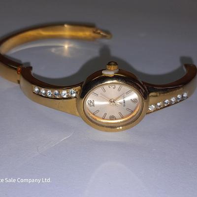 Three Women's watches - Anne Klein II - Gossip - and gold toned band with rhinestones.