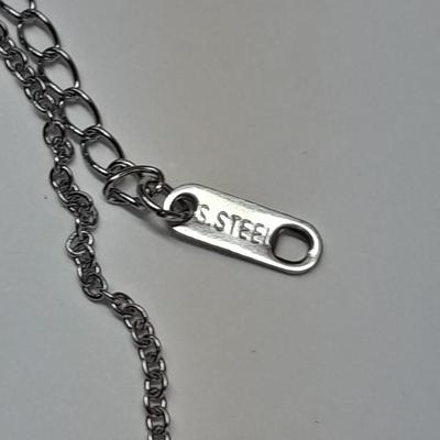 Two necklaces - Plunder and silver toned pendant with chains.