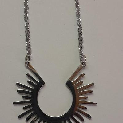 Two necklaces - Plunder and silver toned pendant with chains.