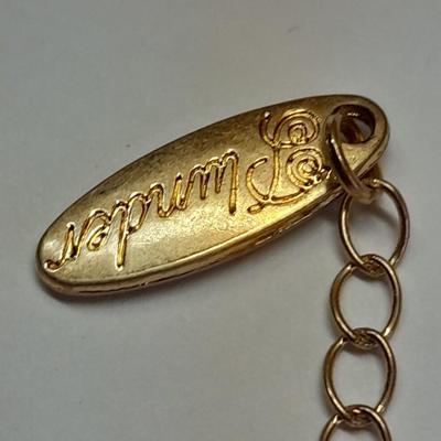 Two necklaces - Plunder and silver toned pendant with chains.