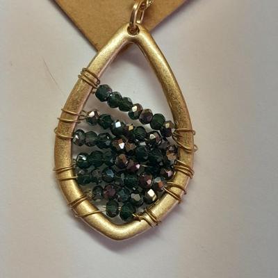 Two necklaces - Plunder and silver toned pendant with chains.