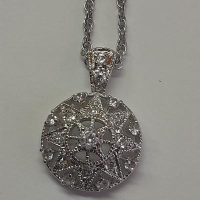Two beautiful pendants with chains - Nice delicate looking necklaces