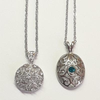 Two beautiful pendants with chains - Nice delicate looking necklaces