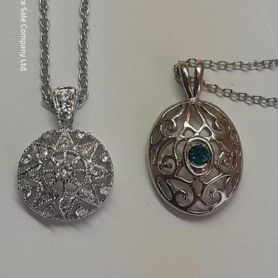 Two beautiful pendants with chains - Nice delicate looking necklaces