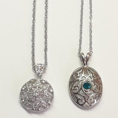 Two beautiful pendants with chains - Nice delicate looking necklaces