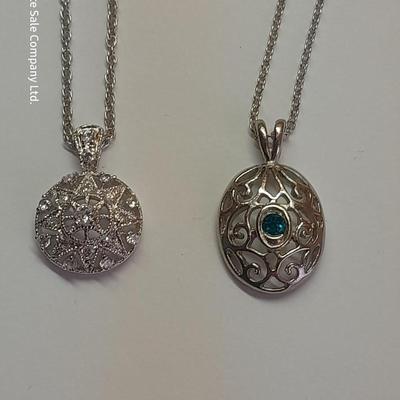 Two beautiful pendants with chains - Nice delicate looking necklaces